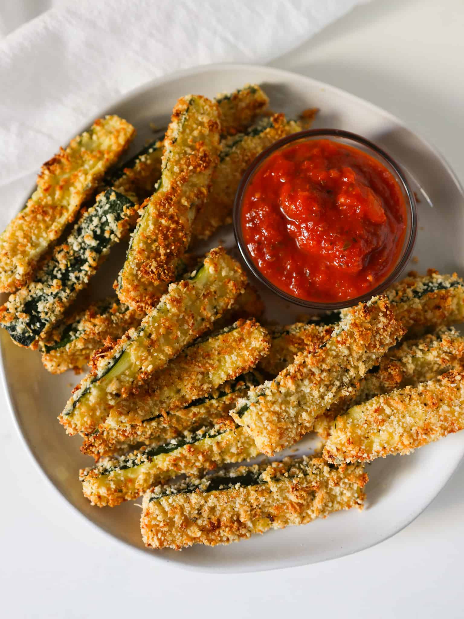 Baked Zucchini Fries with marinara dipping sauce.