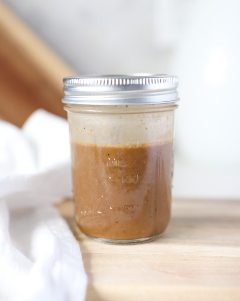 Balsamic Dressing in a clear glass mason jar with a lid