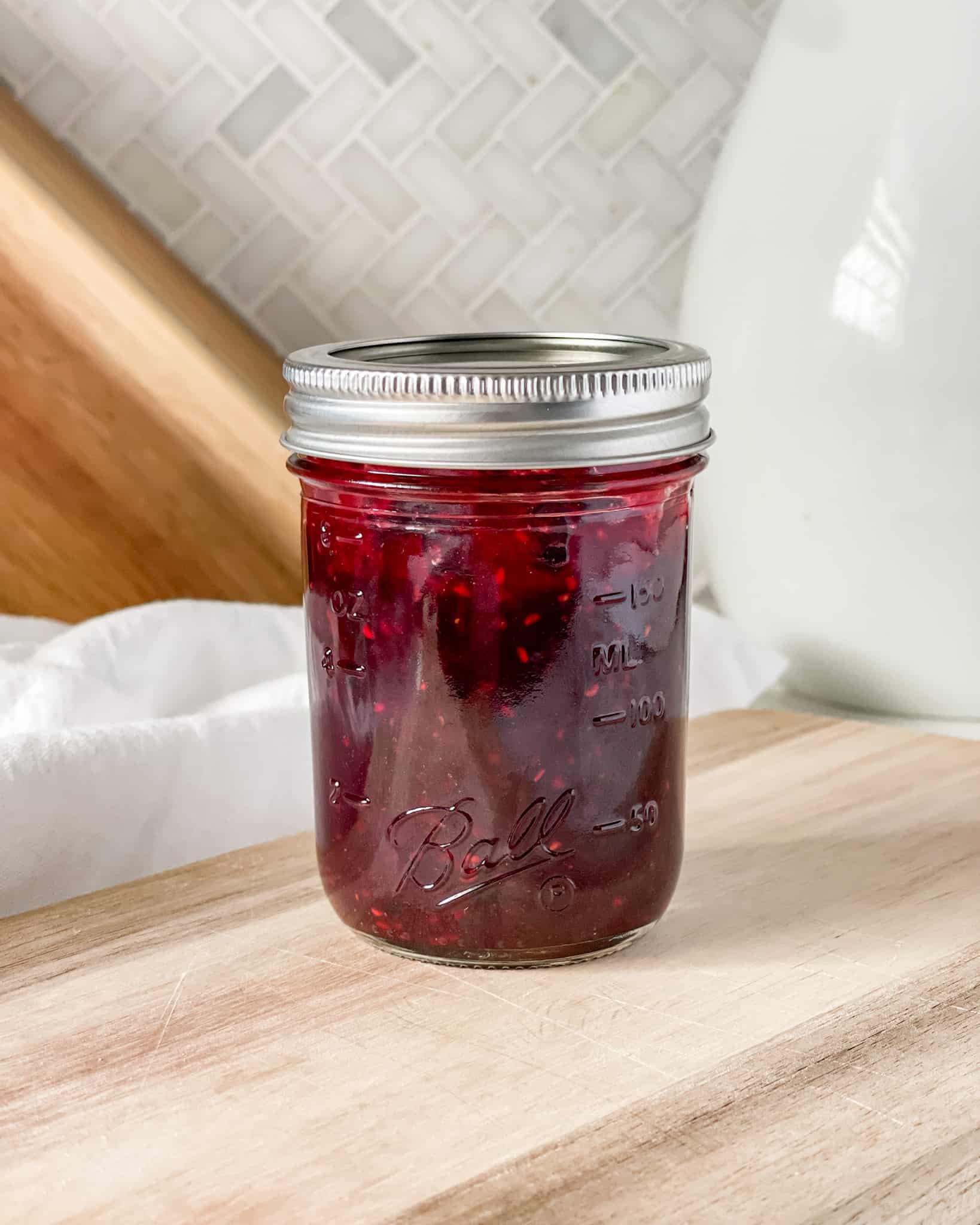 Mixed Berry Jam in a glass mason jar