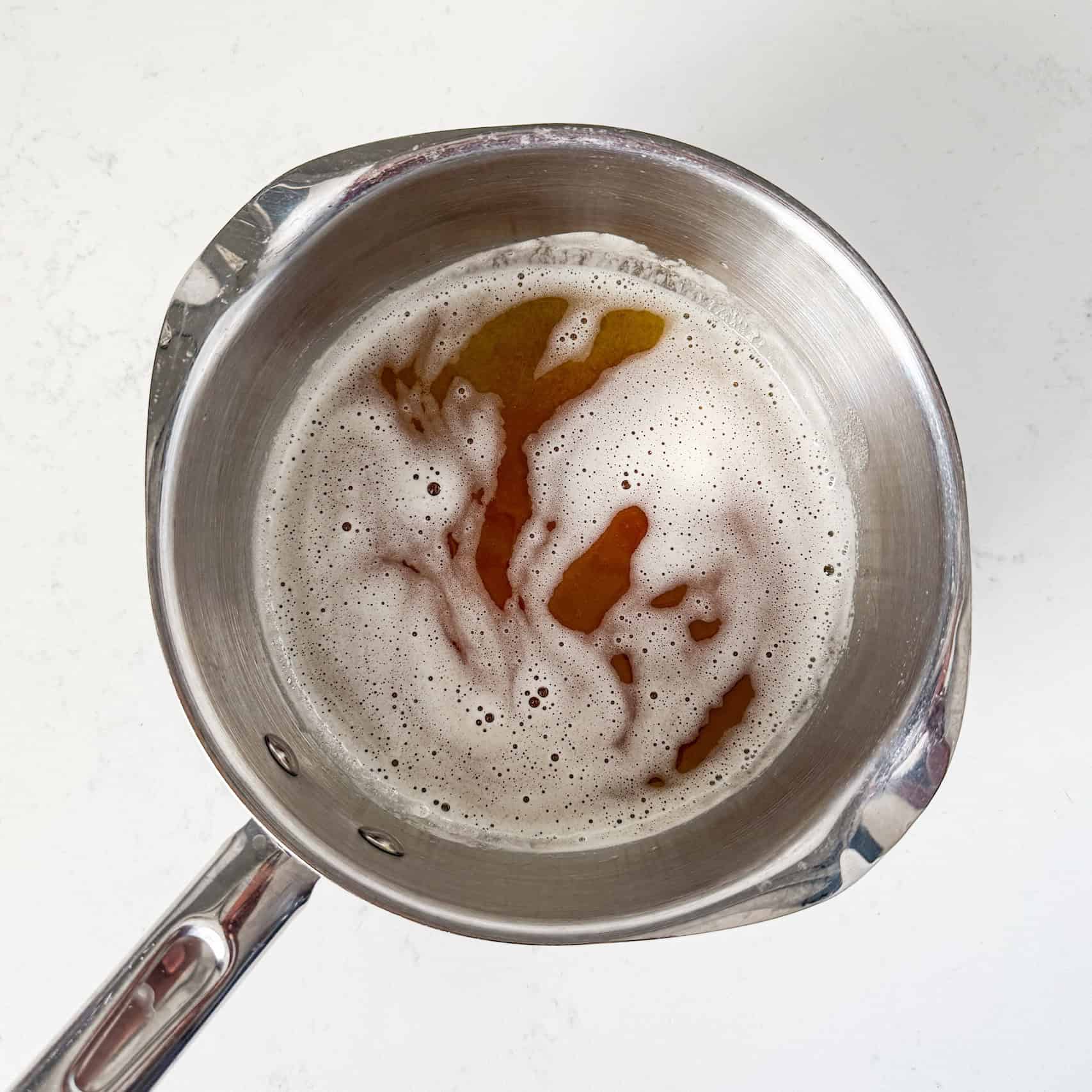 Browned butter in a saucepan.