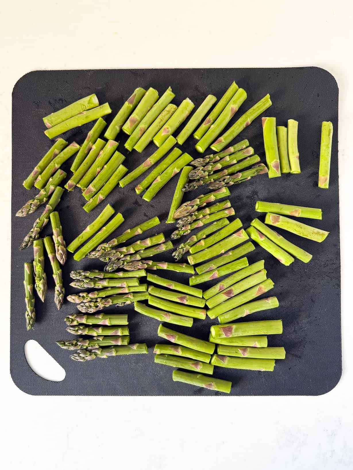 Asparagus cut on a cutting board