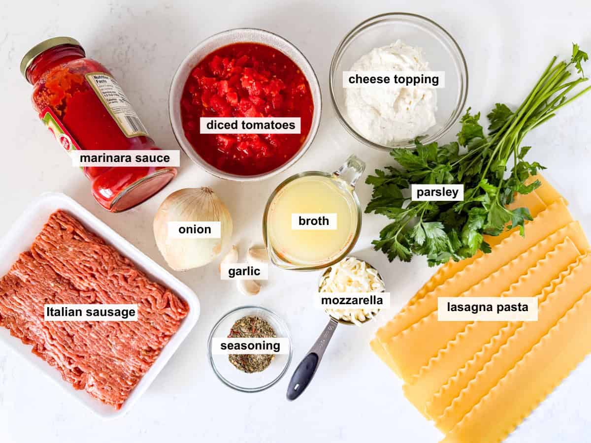 Ingredients for skillet lasagna spread out on a white countertop.