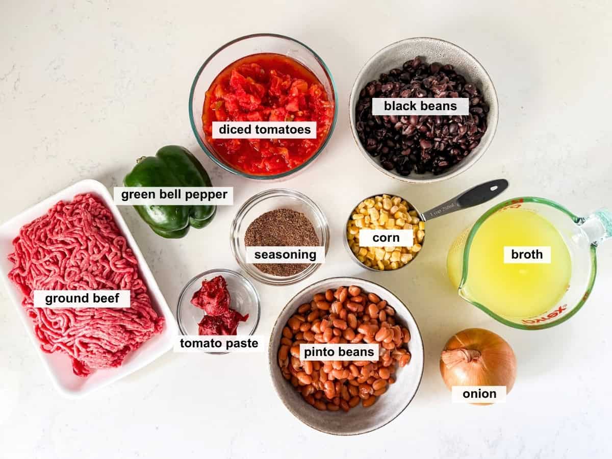 Taco soup ingredients on a white countertop.